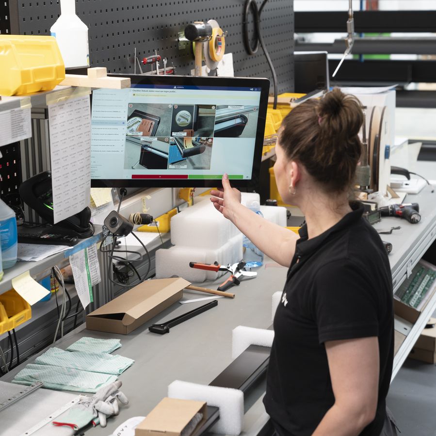 Operator completing a validation check on the Azumuta screen