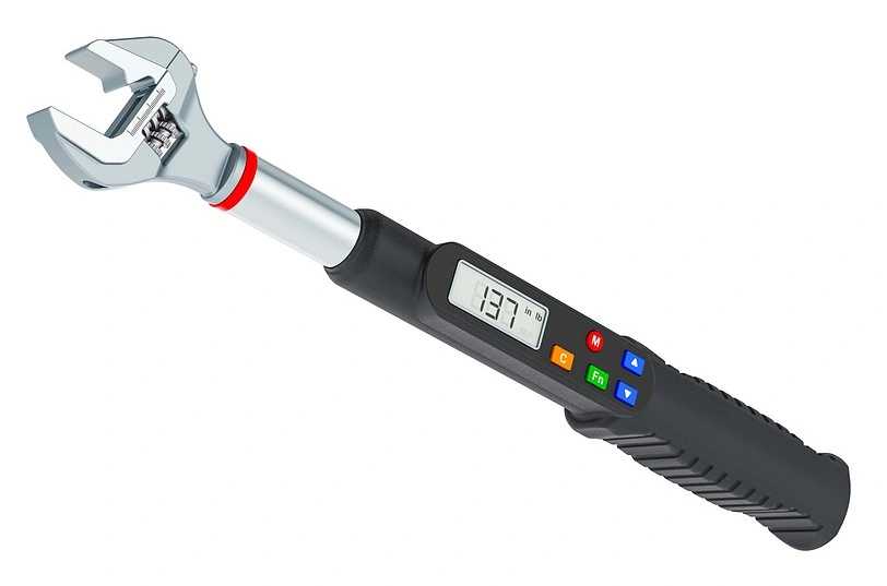 A digital torque wrench with a display screen showing