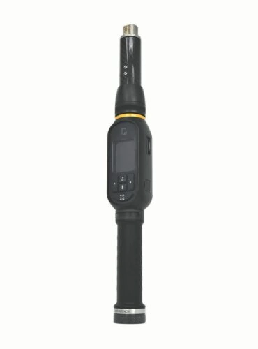 An electronic torque wrench with a digital display is shown against a plain white background. The wrench has a black handle, a cylindrical metal shaft, and a screen with control buttons near the top of the handle.